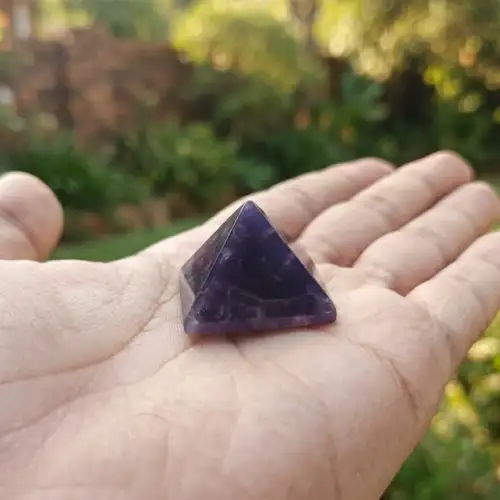 Amethyst Pyramid Purple Crystal Pyramid Resting On An Open Palm
